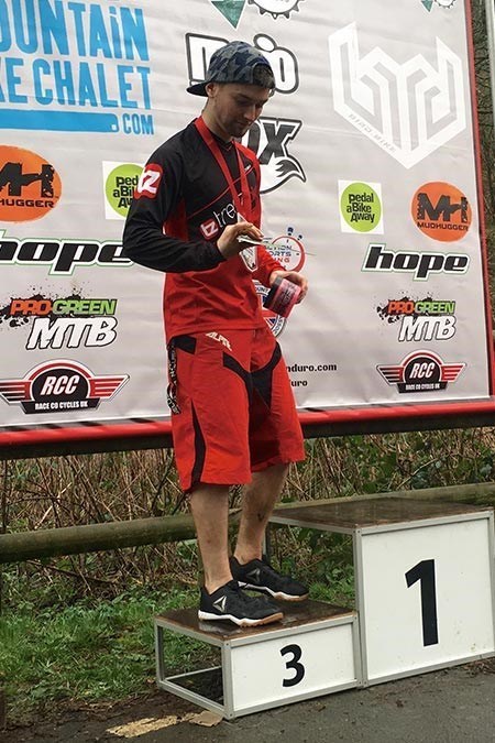 Lewis on the podium